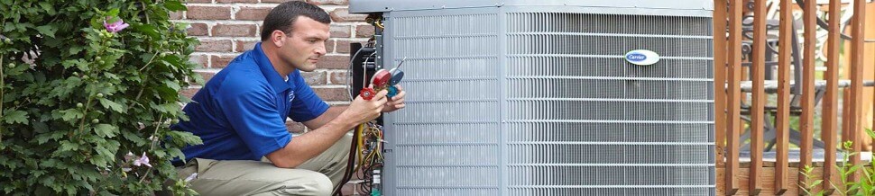 Tech working on a AC unit